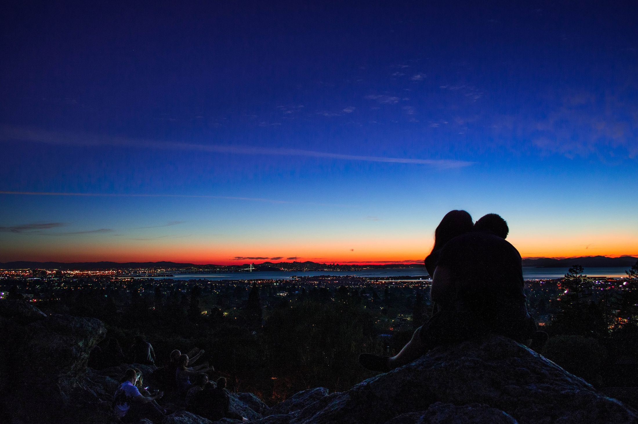 A couple watching the sunset together