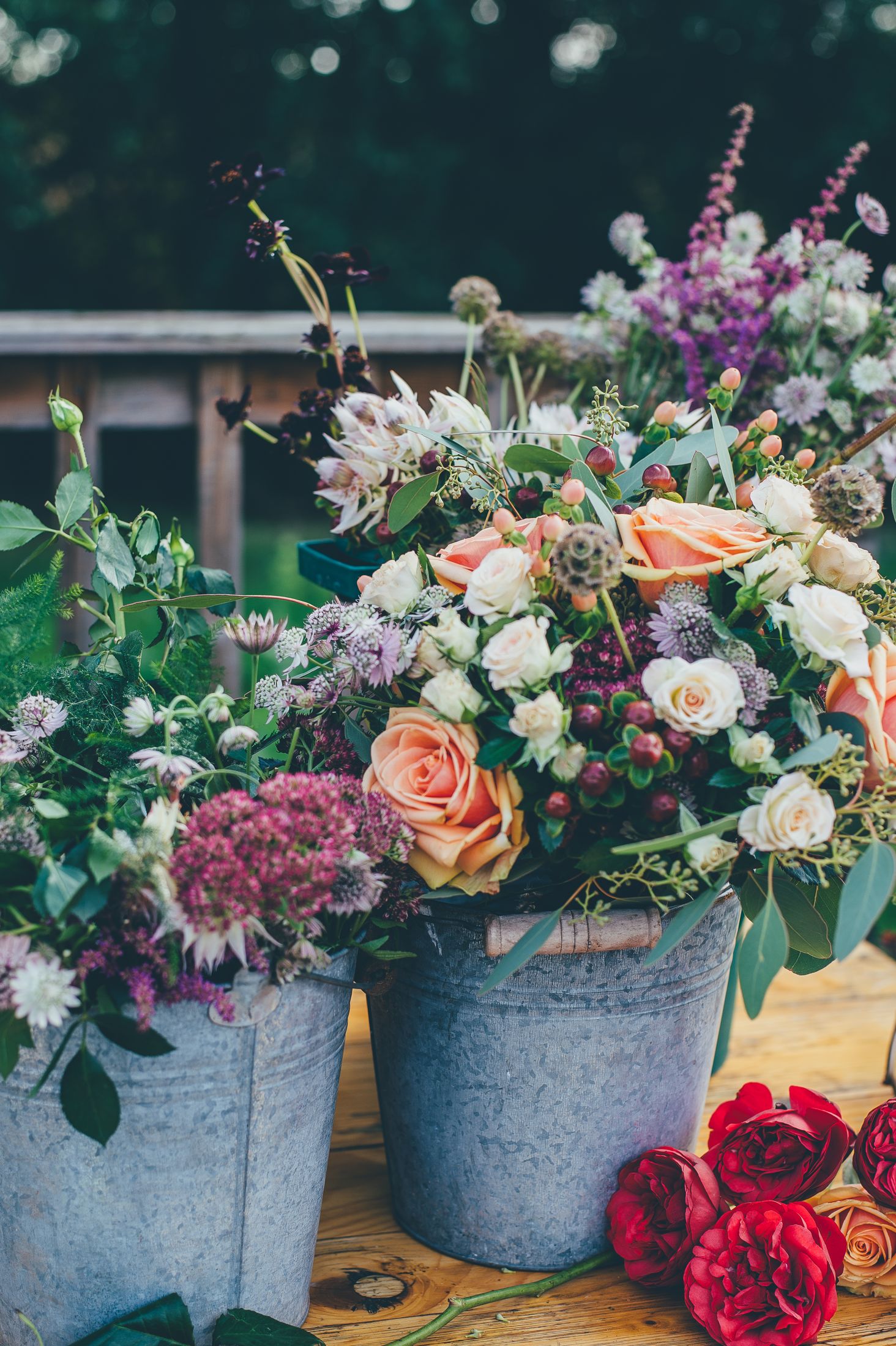 Wedding flowers in buckets